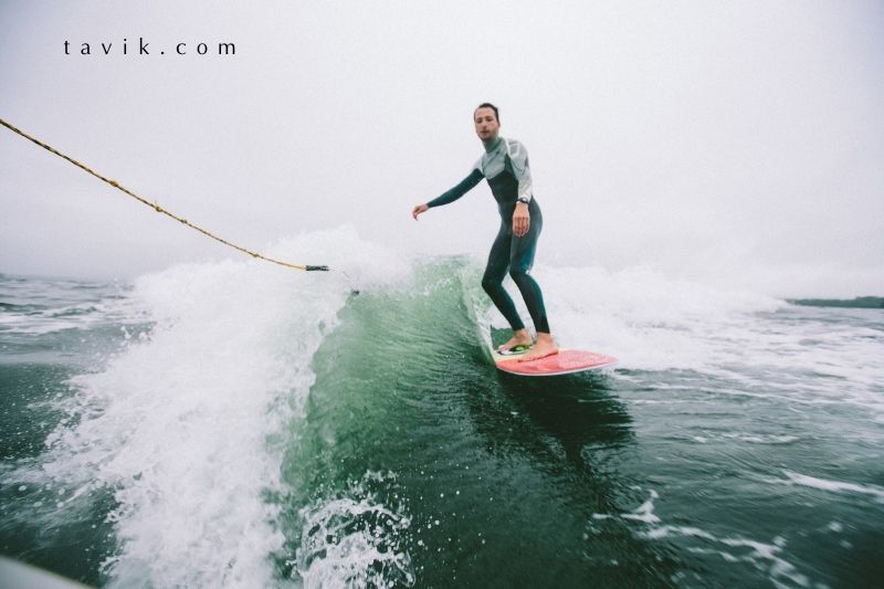 Foot placement for a hang ten is crucial. You want your toes hanging  completely over the edge so that you can grip the board for stabilit